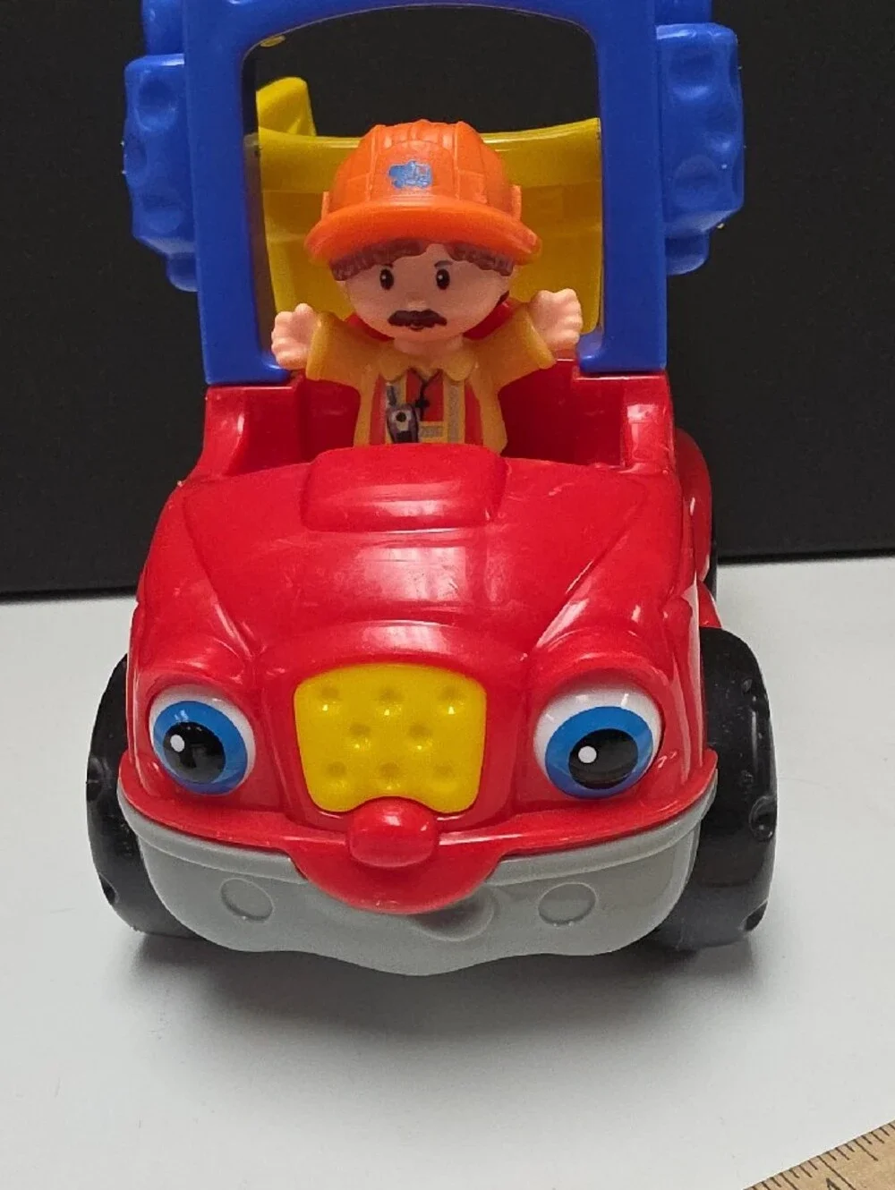 Fisher-Price Little People Red & Yellow Dump Truck with Figure And Accessory